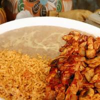 Pollo A La Diabla · Spicy. Grilled chicken in a spicy red sauce served with rice, beans, your choice of tortilla...
