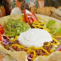 Taco Salad · Deep-fried tortilla filled with your choice of meat, beans, cheese, lettuce, tomato, sour cr...