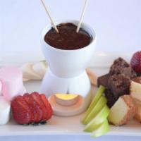 Fondue For Two · Chocolate fondue served with pound cake, fresh fruit, marshmallows, and brownie bites