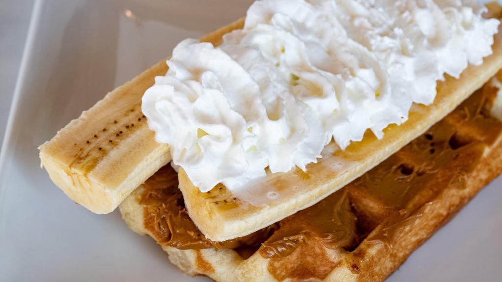 Waffle Me Banana · Cookie Butter spread
Sliced banana
Whipped cream