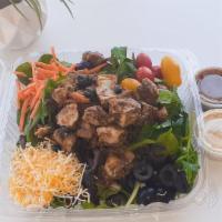 Southwest Chicken Salad · Big Salad with Southwest Chicken, Shredded cheese, Shredded Carrots, Black Olives, Tomatoes,...