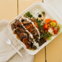 Lamb Over Salad Platter · Lamb cubes grilled with onions, green pepper and carrots on top of salad. Pickled vegetables...