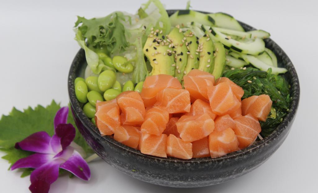 Salmon Salad Bowl · Choice of protein with salad base, pickled cucumber, avocado, carrot, red cabbage, edamame, sweet corn and seaweed salad. Contains raw fish.