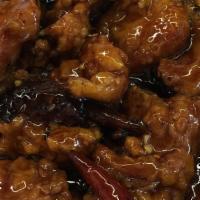 Orange Chicken · Hot and spicy. Best in town! Sautéed fried chicken with orange peel.