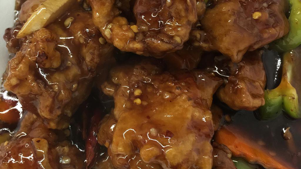 Ginger Chicken · Hot and spicy. Crispy tender chicken sautéed with carrots and bell peppers in ginger sauce.