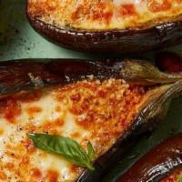 Eggplant Parmesan · Eggplant, Parmesan, and melted mozzarella on top of spaghetti and marinara.