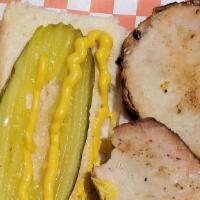 Cubano Sandwich · We start with roasted pork that has been smoked for 18 hours, then we add sliced smoked ham,...