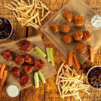 Boneless 16-Count Party Pack · 16 count order of boneless wings tossed in up to 2 different flavors or naked with up to 2 d...