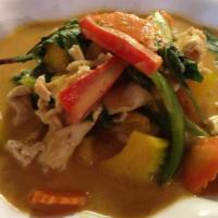 Pumpkin Curry · Thai red curry with pumpkin, carrot, bell, and basil.