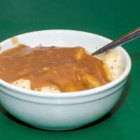 Mash Potatoes And Gravy  · mash potatoes with house made gravy