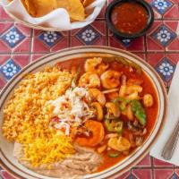 Camarones A La Diabla · Grilled shrimp cooked with onions and diabla sauce, served with rice, beans and a side of to...
