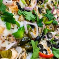 Spicy Bite · Red onions, bell peppers, mushrooms, black olives, ginger, jalapenos and fresh cilantro on o...