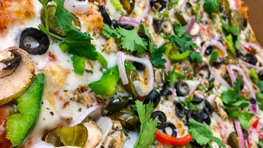 Spicy Bite · Red onions, bell peppers, mushrooms, black olives, ginger, jalapenos and fresh cilantro on ours signature Indian pizza sauce.