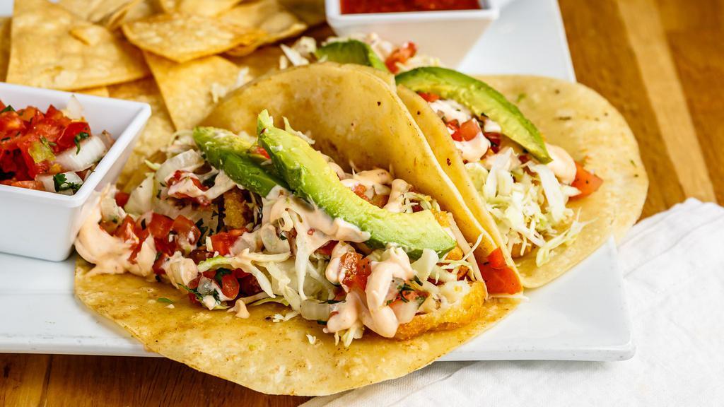 Philly Fish Tacos · Two beer-battered fish tacos on flour or corn tortillas with smoky chipotle mayo, shredded cabbage, avocado and garden fresh pico de gallo. Served with chips & salsa.