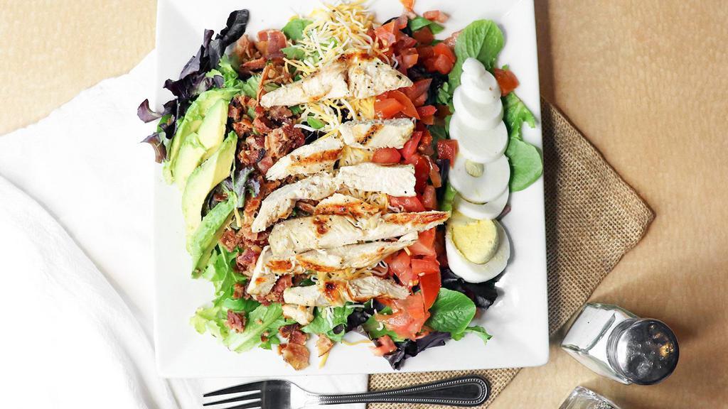 Chicken Cobb Salad · Fresh greens With choice of grilled or fried chicken, diced tomatoes, crisp bacon, twin cheeses, hard-boiled egg.