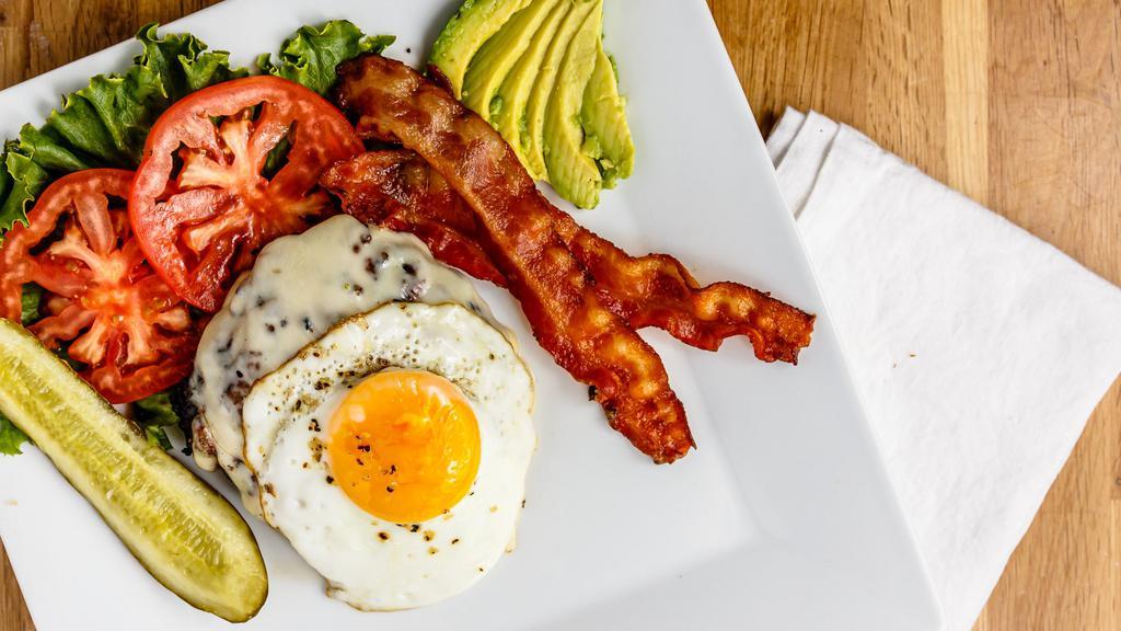 The Rocky Balboa Burger · High protein option with a grilled 8 oz. Hamburger, sunny side up egg, avocado and bacon. Served with lettuce, tomato and no bun.