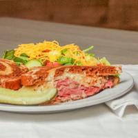 Reuben · In-house made corned beef, sauerkraut, swiss cheese, and thousand island on grilled marble r...