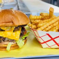 Double Cheese Burger · Two 100% fresh, never frozen, beef patties on a fresh bun, topped with American cheese, with...