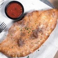 Colossal Calzones · We start with marinara and a Ricotta & Mozzarella blend. You pick any two items from our piz...
