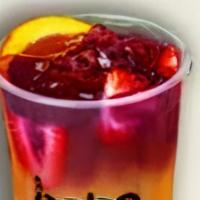 Sunset · Mango, orange and pineapple fruit tea. topped off with rainbow jellies, fresh fruits and but...