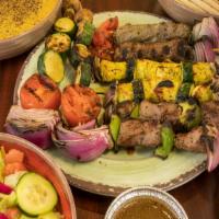 Kabob Platter Family Meal · Get 8 meat and/or veggie kabobs with an 8 oz sauce of your choice, a large house rice, a lar...