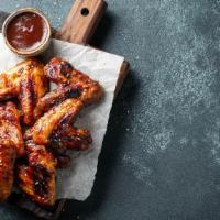 8 Pieces Bbq Chicken Wings · 8 Pieces of Perfectly baked, crispy chicken wings, with an added kick of BBQ sauce. Served i...