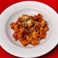 Rigatoni Bolognese · Rigatoni pasta with slow cooked meat sauce.