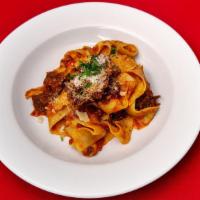 Pappardelle Al Cinghiale · Fresh pappardelle pasta in a slow cooked wild boar sauce