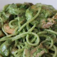 Spaghetti Mare E Monti · Spaghetti in creamy pesto, sauteed shrimp & mushrooms