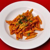 Penne All'Arrabbiata · Penne pasta with marinara sauce and red pepper flakes.