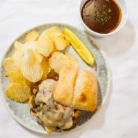 Barn Yard Burger Dip · A juicy burger patty with havarti cheese, mushrooms, pepper, onion, and a demi glace on ciab...