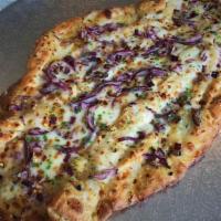 Weirdough Alfredo · An Abstract thin dough, light alfredo sauce, fresh crushed garlic, Light mozzarella, RED oni...