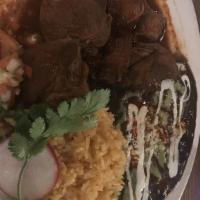 Lamb Birria · Stewed lamb served with beans, rice, pico de gallo served with two fresh tortillas.