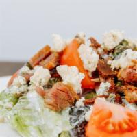 The Wedge · Infinite Harvest Romaine Lettuce,  Blue Cheese Crumbles, Crispy Pork Belly, Pickled Shallots...