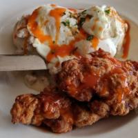 Chicken Fried Biscuits & Gravy · Buttermilk fried chicken with a fresh made biscuit, two eggs over easy and mashed potatoes a...