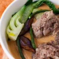 Kare Kare · Beef oxtail and shank cooked in peanut sauce with eggplant and long beans. Comes with specia...