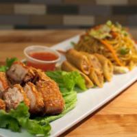 Crispy Pata · Regular. Roasted then deep fried pork hock. Comes with spicy soy-vinegar, crushed garlic and...