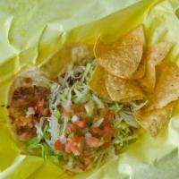 Carnita Taco · Soft corn tortilla, guacamole, fresh mex and lettuce.