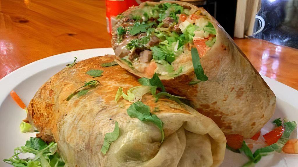 Beef Burrito · Cheese, shredded meats cooked with onion, tomato, bell pepper for flavor.