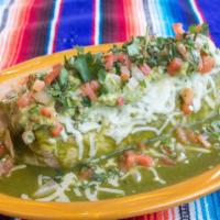 Wet Burrito · Choice of meat or veggie, rice, beans wrapped up and smothered in red or green enchilada sau...