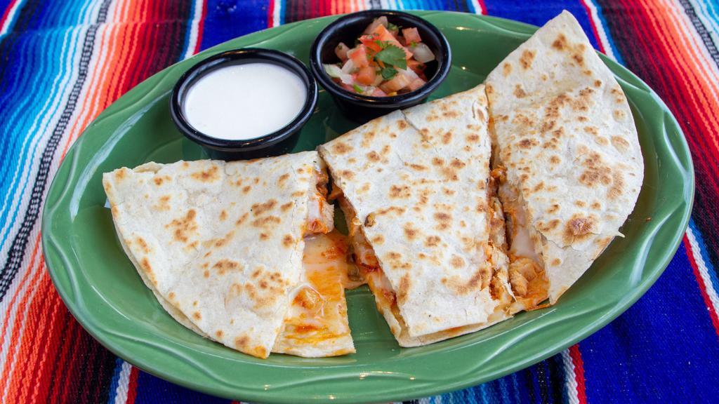 Flour Quesadilla · Grilled Monterey jack cheese on a corn tortilla with pico + sour cream.