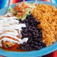 Chile Relleno Plato · Poblano pepper stuffed with cheese or chicken in an egg batter, served with our special rell...