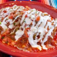 Chile Relleno · A poblano chile breaded and stuffed with chicken or cheese, covered in a mild salsa, cheese,...
