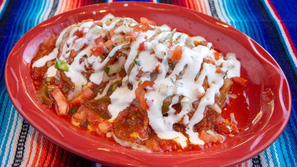 Chile Relleno · A poblano chile breaded and stuffed with chicken or cheese, covered in a mild salsa, cheese, sour cream and pico.