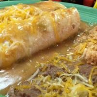 Combo 9 (2 Smothered Beef & Bean Burritos) · Two small beef and bean burritos smothered in our signature green chili with rice and beans.