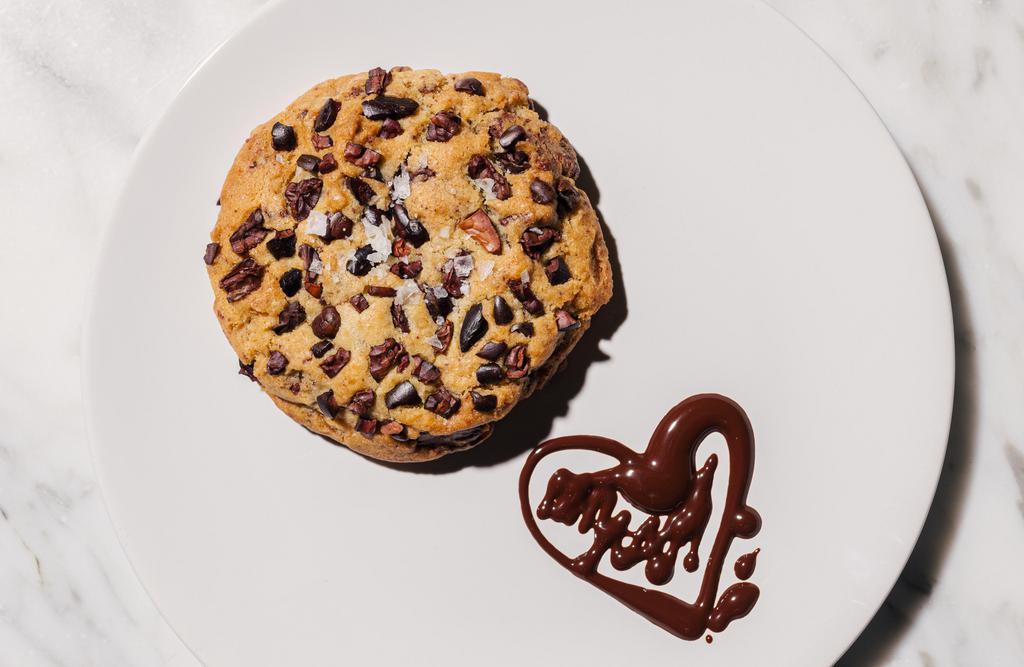 Browned Butter Chocolate Chip Cookie With & Nibs · Our play on a chocolate chip cookie made with our house-made chocolate and cacao nibs, browned butter, and sea salt. 

Great enjoyed with one of cafe drinks or teas.