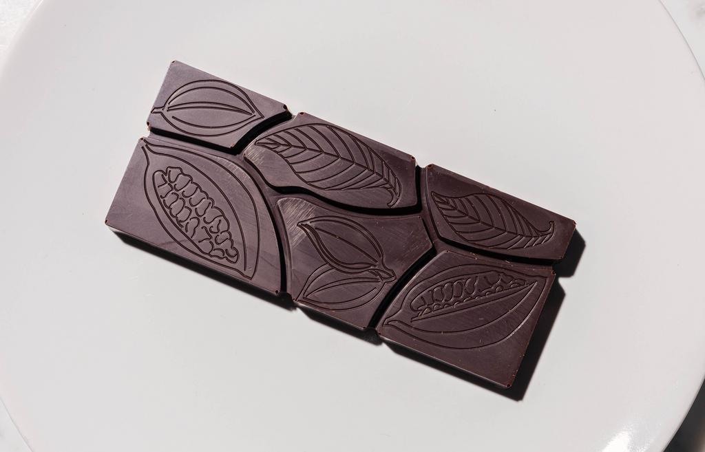 Single Origin Chocolate Bars · 72% Dark Chocolate Bar made with cocoa beans, sugar, cocoa butter, and love.

Made in Pike Place Market, Seattle WA