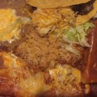 #1 · Beef Taco ,Beef Tamale and Cheese Enchilada with rice and beans
