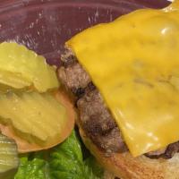 Cheeseburger · 1/3 lb. Patty, American cheese, lettuce, tomato, onion, pickles, and homemade mayo. Served w...