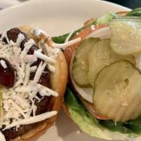 Greek Burger · 1/3 lb. patty, Feta cheese, lettuce, tomato, onion, pickles, olive, pepperoncini, and mayo. ...